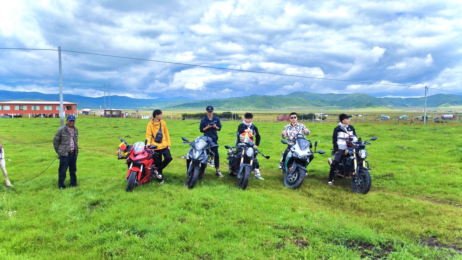 Yunjie with motorcycle touring group on the western Sichuan grasslands